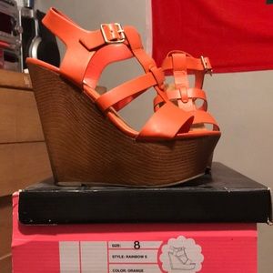 Brand new NEVER BEEN USED orange wedges